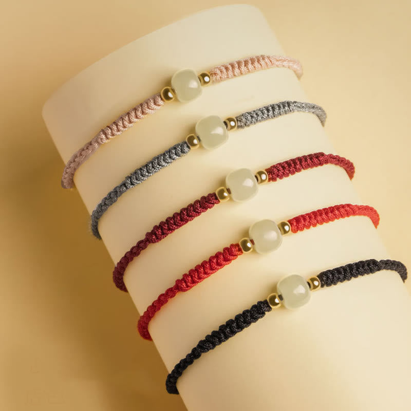 Pulsera trenzada de abundancia de cuentas de la suerte de jade hecha a mano con Buddha Stones