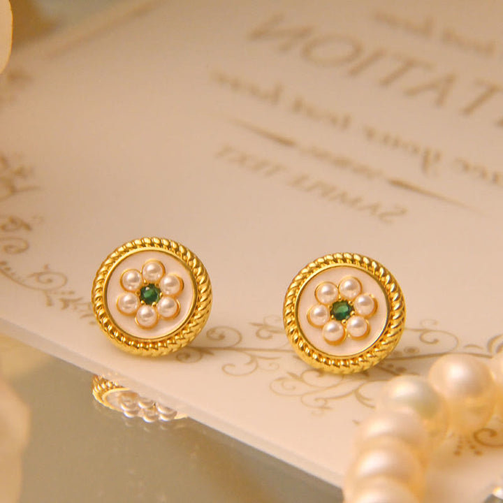 Pendientes de la suerte con flores esmaltadas y Buddha Stones