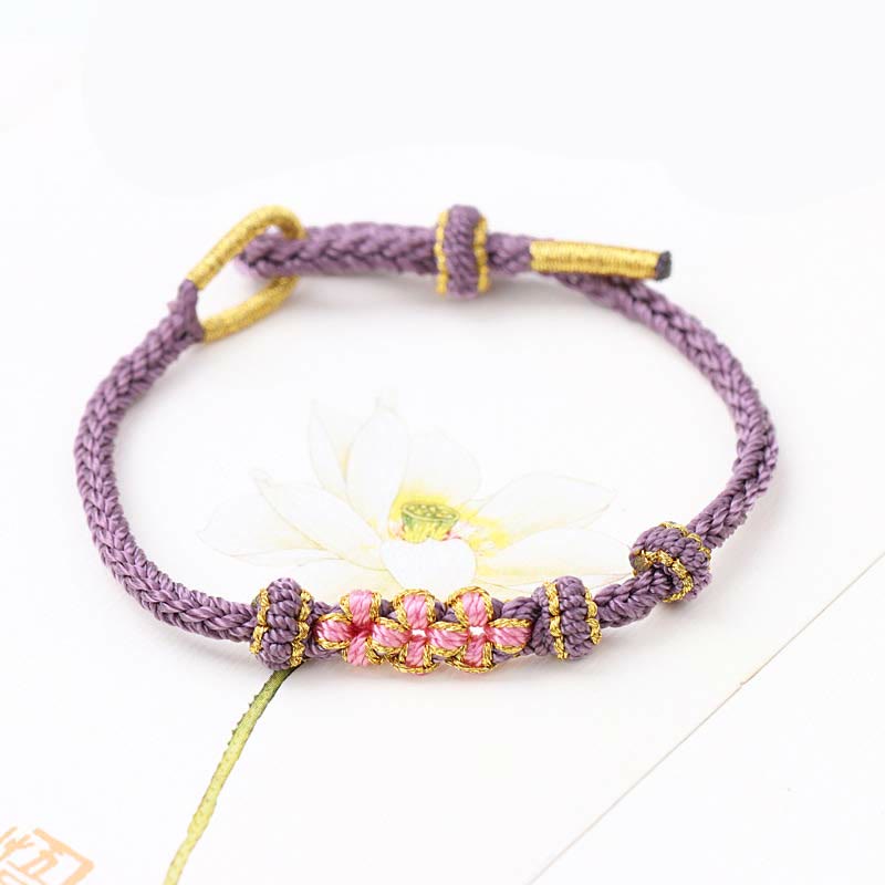 Pulsera de cuerda trenzada de ocho hebras de la suerte con tres flores de melocotón hechas a mano con Buddha Stones