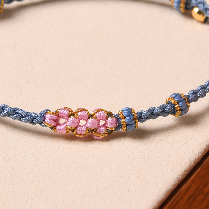 Pulsera de cuerda trenzada con protección de flor de melocotón hecha a mano con Buddha Stones