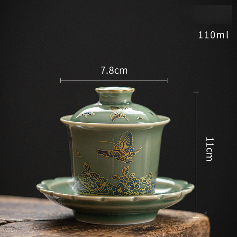Buddha Stones de porcelana verde, mariposa, flor, salmón, pescado, cerámica, Gaiwan Sancai, taza de té de Kung Fu y platillo con tapa