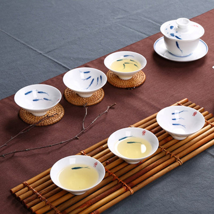 Buddha Stones Jingdezhen, porcelana azul y blanca, pez Koi, taza de té de cerámica, tazas de té de Kung Fu