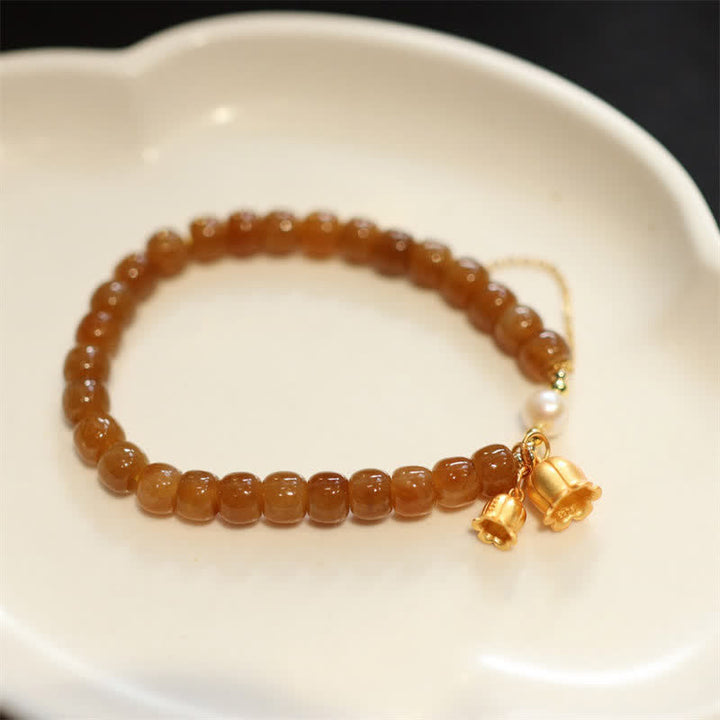 Pulsera con dije de lirio de los valles de jade hetiano natural de plata de ley 925