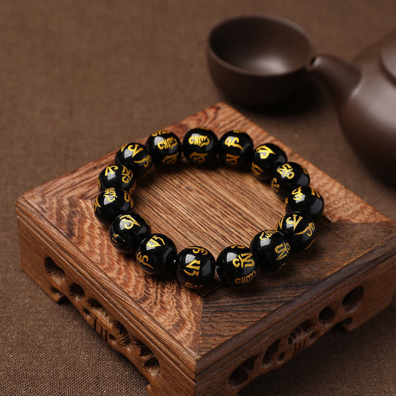 Pulsera de meditación Om Mani Padme Hum de ónix negro y cristal blanco del Tíbet con Buddha Stones