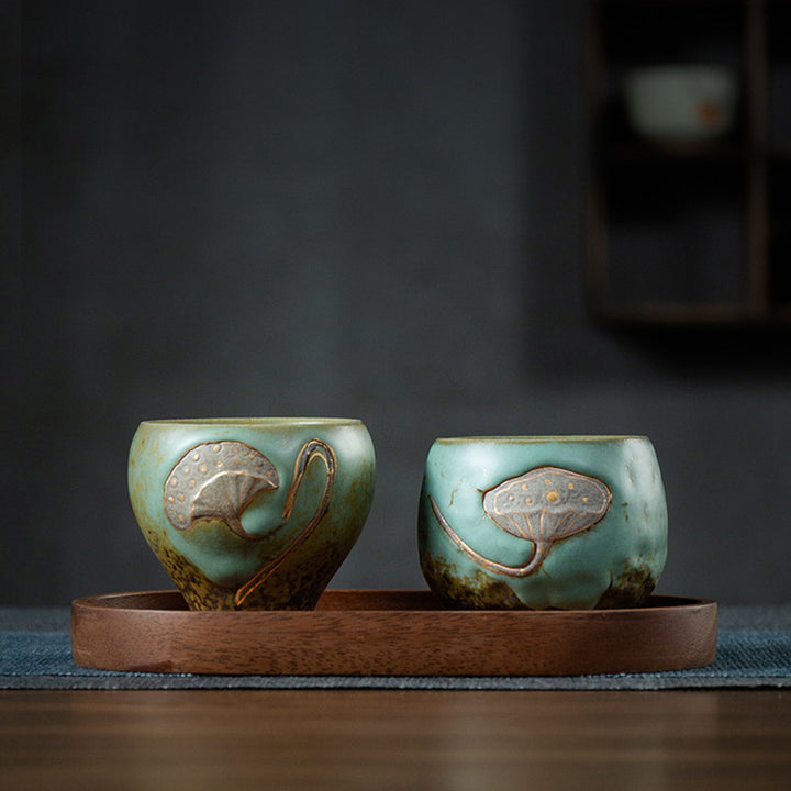 Taza de té de Kung Fu con Buddha Stones , vaina de loto grabada