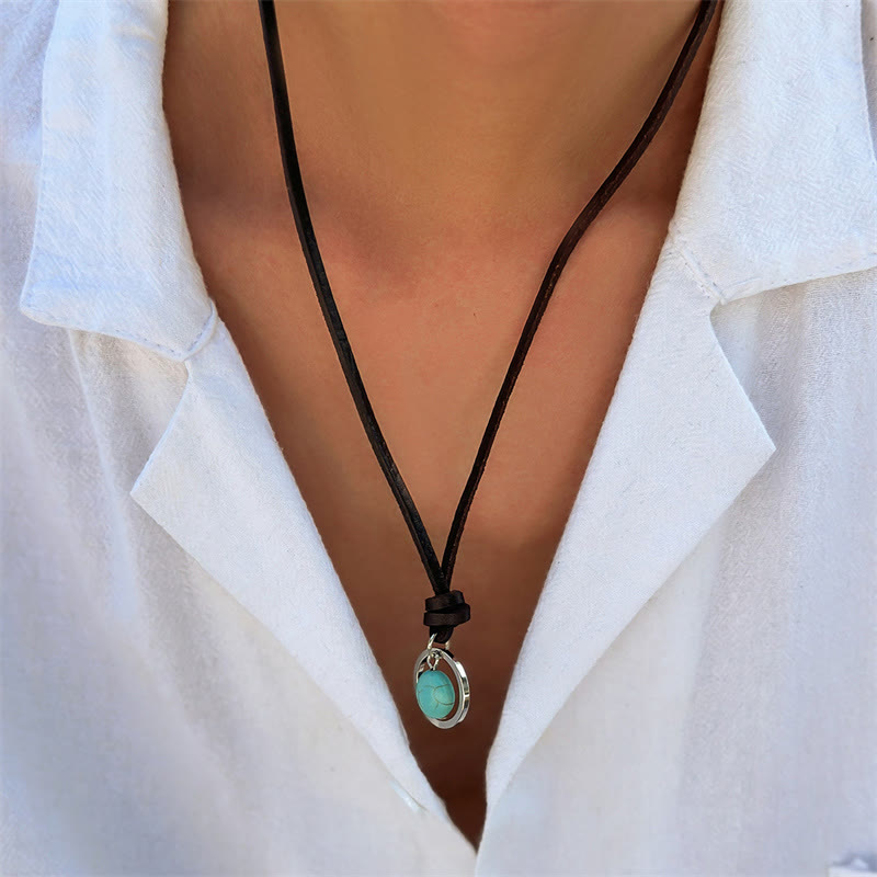 Colgante de collar de fuerza de protección de piedra turquesa redonda de Buddha Stones
