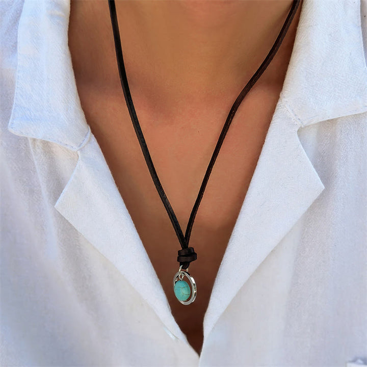 Colgante de collar de fuerza de protección de piedra turquesa redonda de Buddha Stones