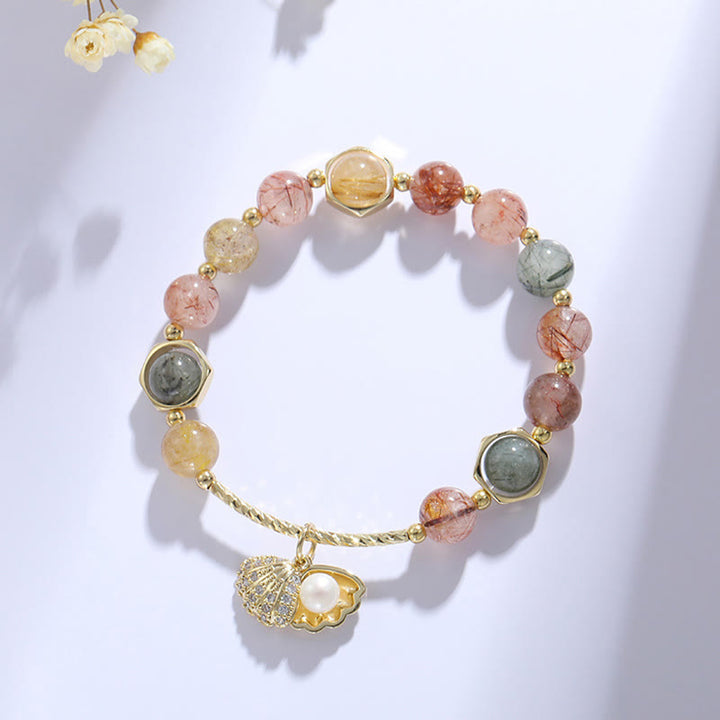 Pulsera de cuentas de protección de concha de cuarzo rutilado de colores naturales con Buddha Stones
