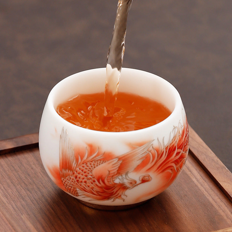 Taza de té de cerámica de porcelana blanca Fénix con Buddha Stones, taza de té de Kung Fu