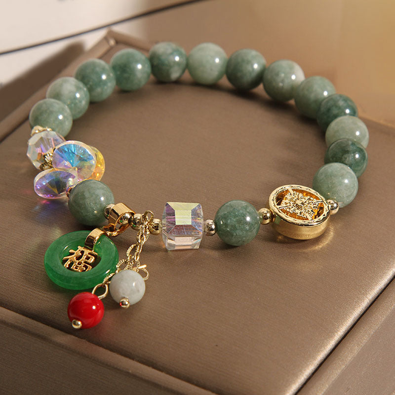 Pulsera curativa con dije de personaje Fu de jade, cuarzo fresa y piedras de Buddha Stones