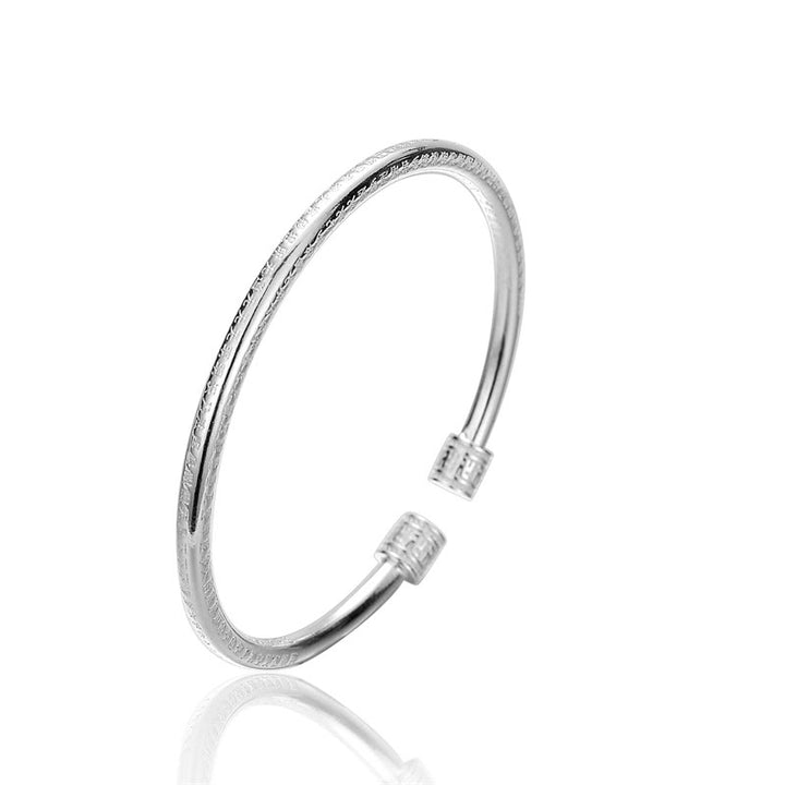Brazalete de cobre blanco con diseño de esvástica grabado en Sutra del corazón