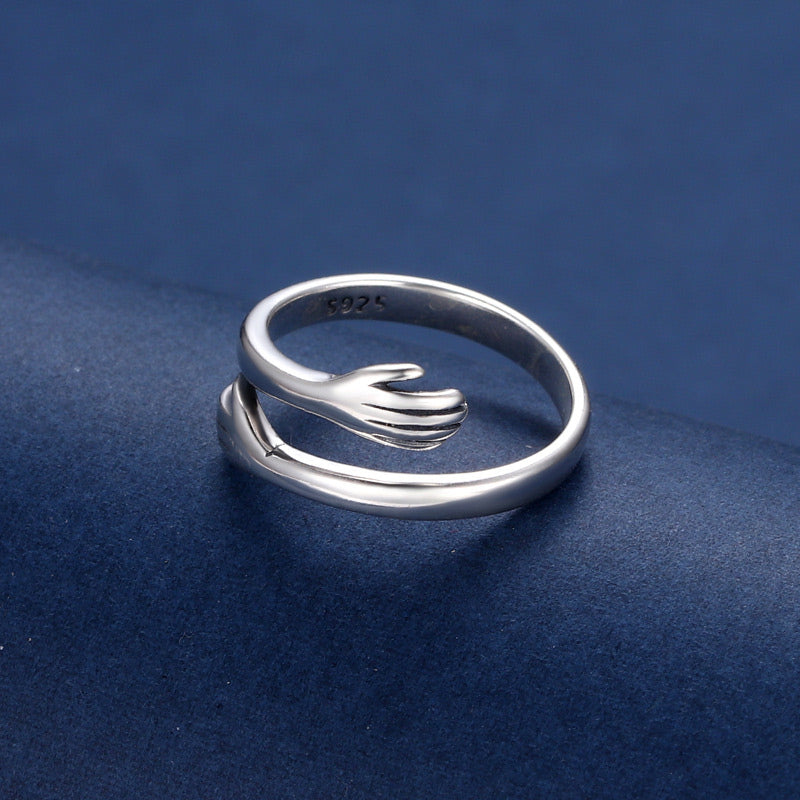 Anillo para pulgar con abrazo de amor en plata de ley 925 con Buddha Stones