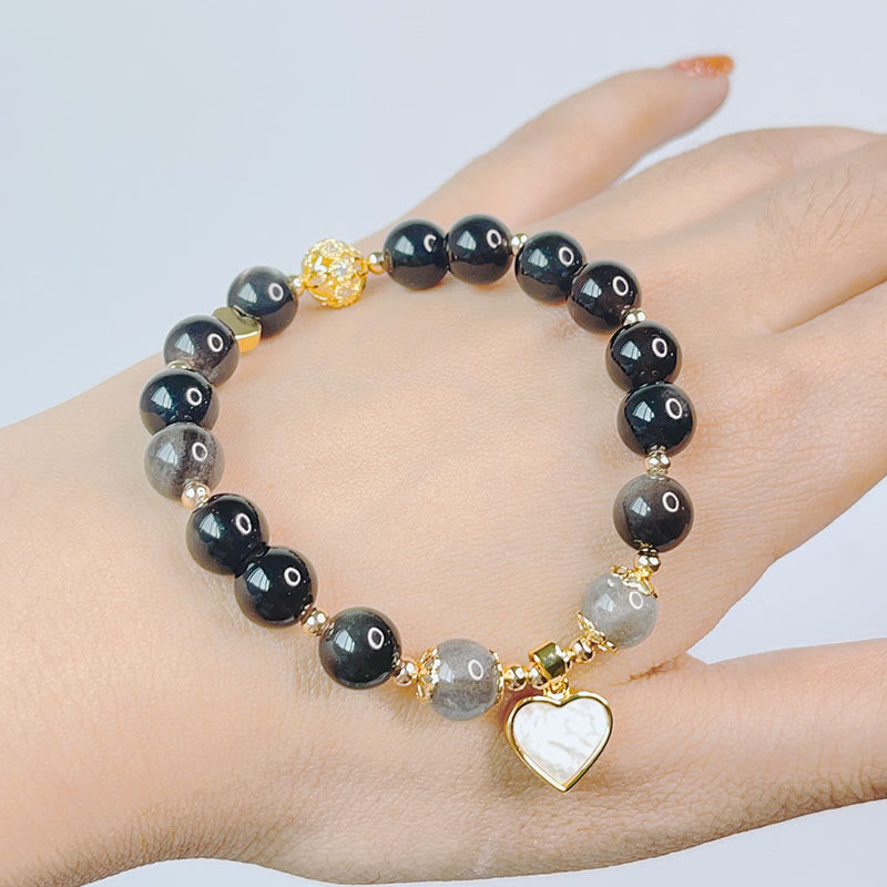 Pulsera de protección de flor de estrella de corazón de amor de obsidiana con brillo de plata natural de Buddha Stones