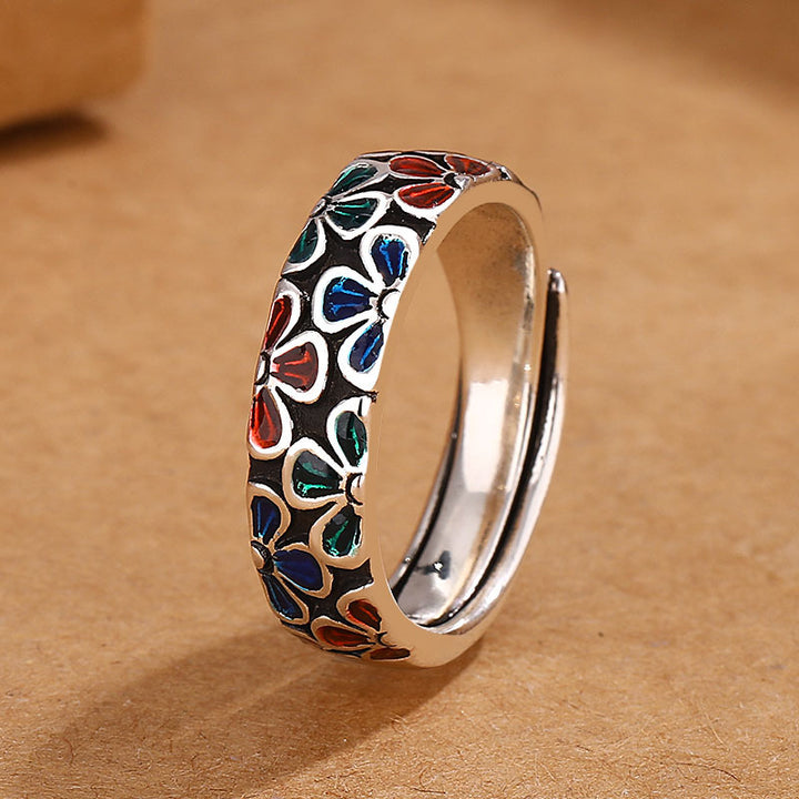 Anillo ajustable de cobre curativo con diseño de flores de ciruelo coloridas y Buddha Stones