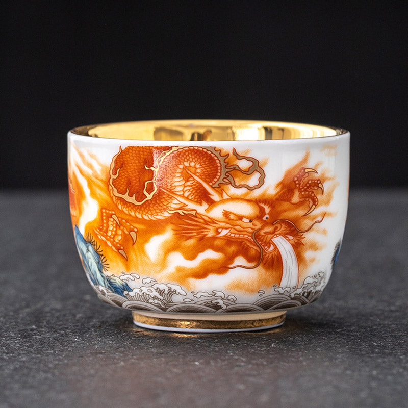 Buddha Stones Dragón Fénix Grulla Sol Océano Olas Taza de té de cerámica dorada Taza de té de Kung Fu 170 ml