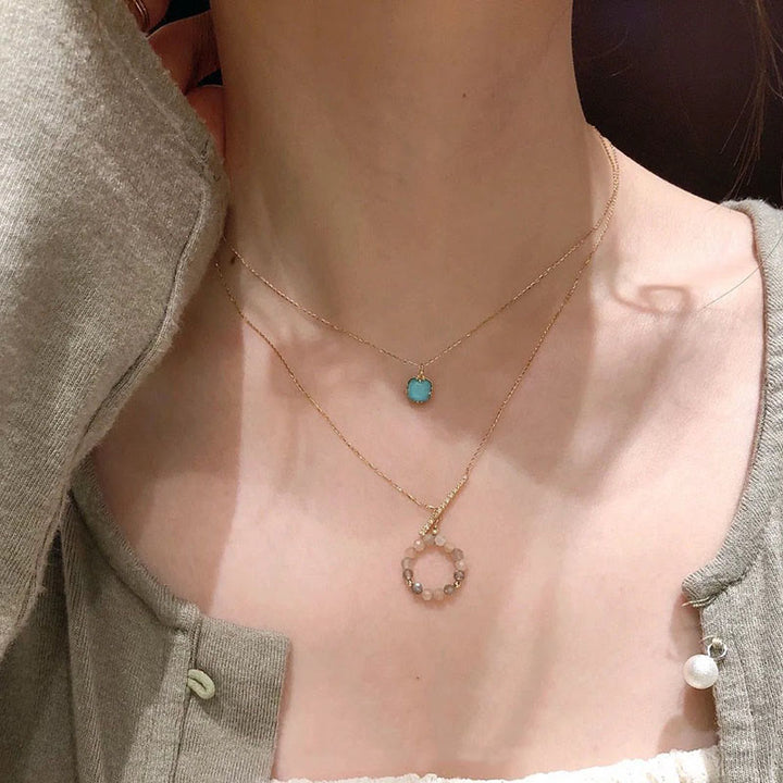 Juego de colgante y collar con anillo de protección chapado en plata de ley 925 con Buddha Stones