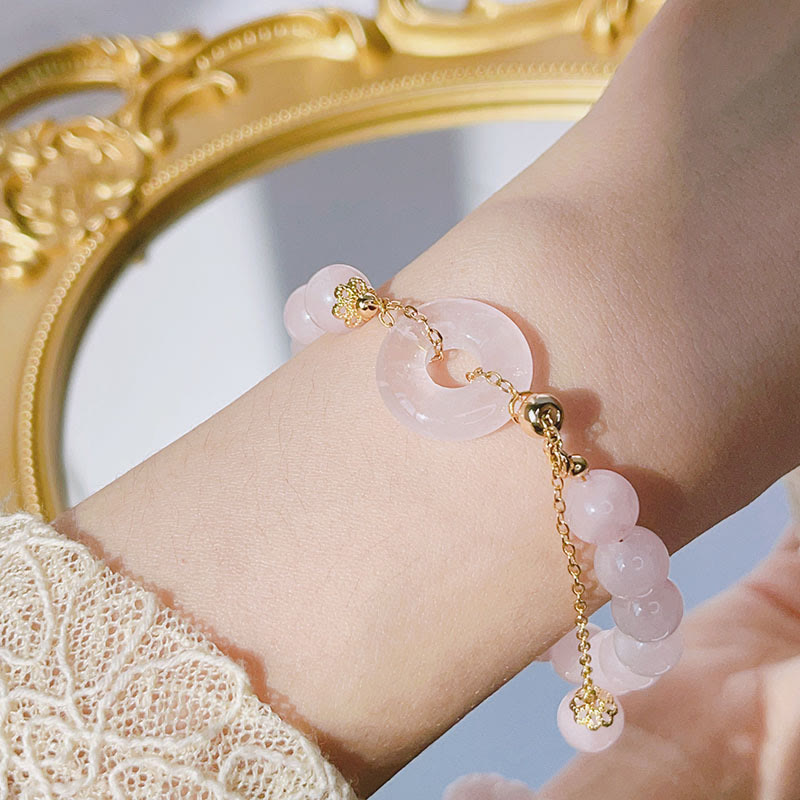 Pulsera con dije de amor con hebilla de paz y cristal rosa natural con Buddha Stones