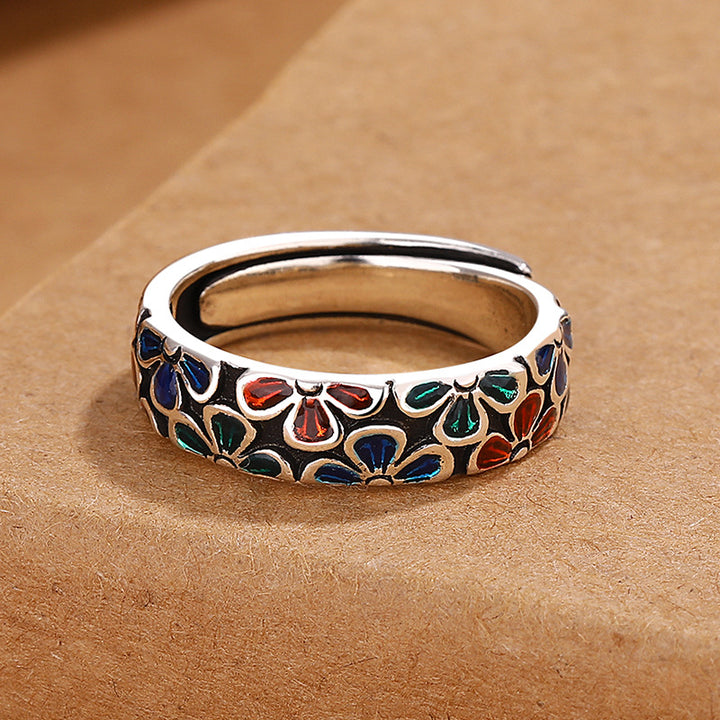 Anillo ajustable de cobre curativo con diseño de flores de ciruelo coloridas y Buddha Stones
