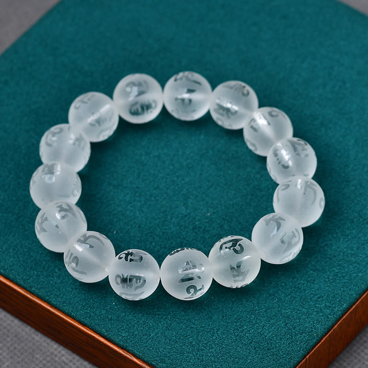 Pulsera de meditación Om Mani Padme Hum de ónix negro y cristal blanco del Tíbet con Buddha Stones