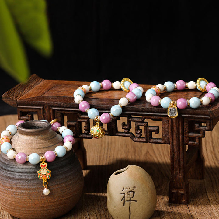 Buddha Stones tibetano Zakiram diosa de la riqueza conejo cabeza de león encanto Liuli vidrio incienso ceniza porcelana cuentas pulsera de protección