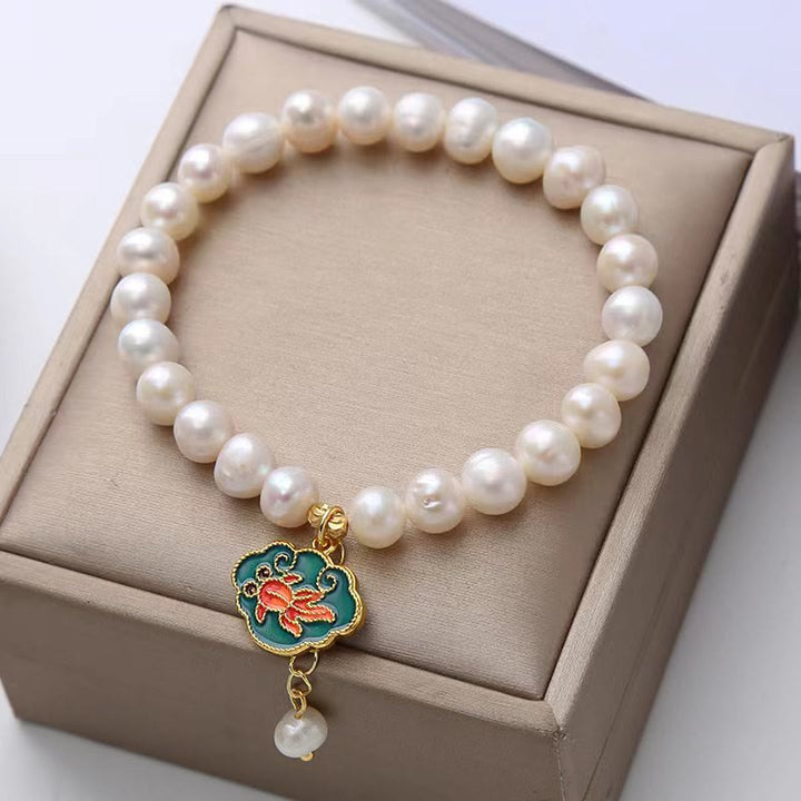 Pulsera con dije de optimismo, pez dorado, pez koi, perla natural