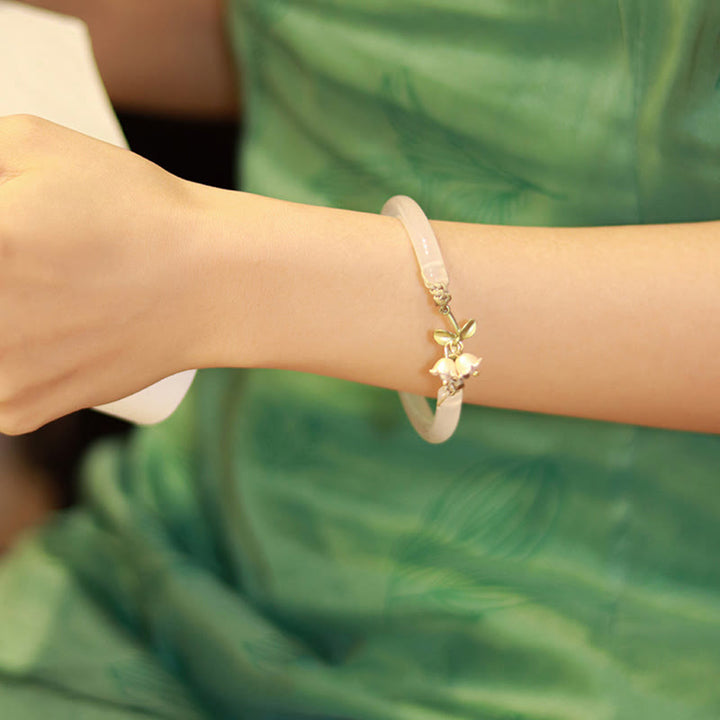 Brazalete de pulsera de fuerza de felicidad de flor de lirio de los valles