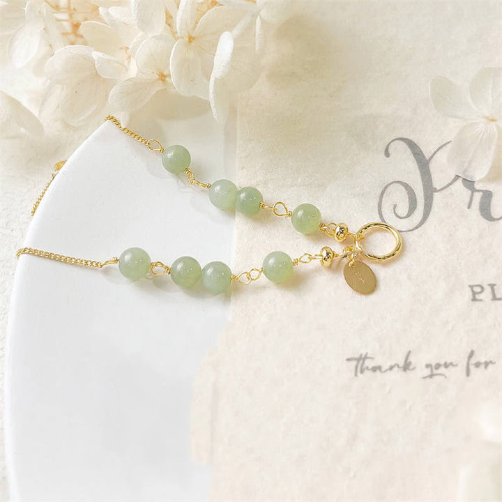 Pulsera con cuentas de suerte llena de oro de 14 quilates con jade hetiano natural único de Buddha Stones