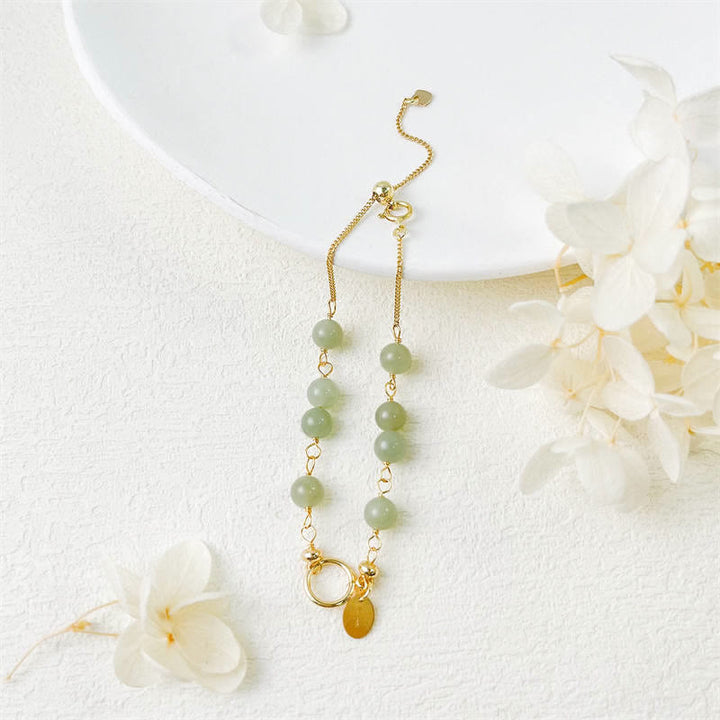 Pulsera con cuentas de suerte llena de oro de 14 quilates con jade hetiano natural único de Buddha Stones