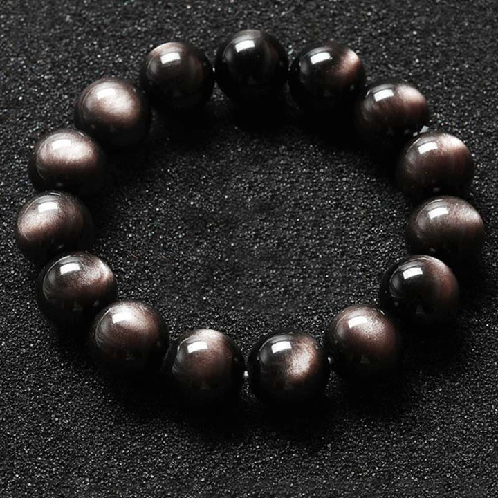 Pulsera de protección calmante de obsidiana brillante de plata natural con Buddha Stones