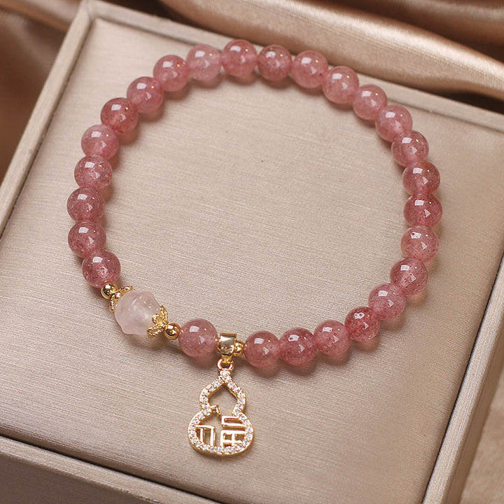 Pulsera positiva con dije de personaje Fu de calabaza de cuarzo fresa con Buddha Stones