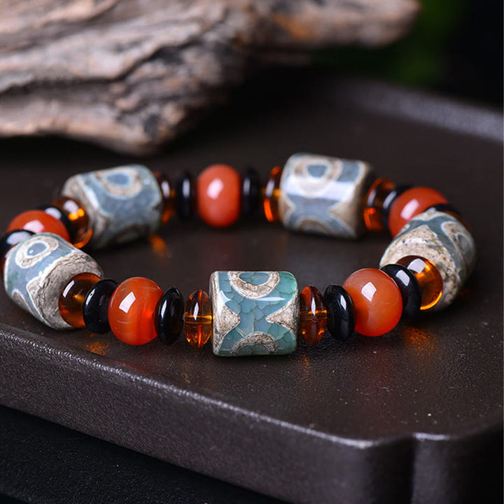 Pulsera tibetana de la felicidad con cuentas Dzi de tres ojos y Buddha Stones