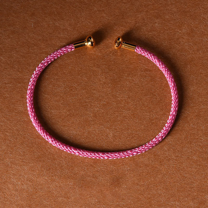 Pulsera de cuerda trenzada de la suerte hecha a mano con diseño simple de Buddha Stones