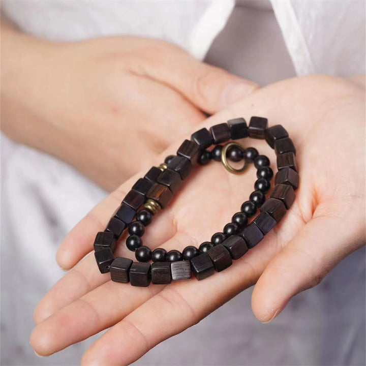 Pulsera de doble vuelta con cuentas cuadradas de madera de ébano del Tíbet y Buddha Stones