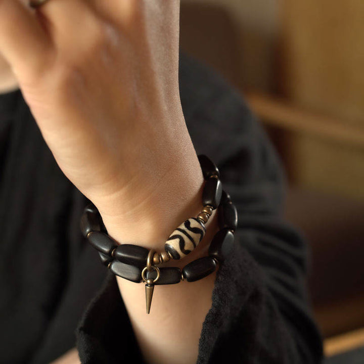 Pulsera de doble envoltura con cuentas Dzi de madera de ébano del Tíbet con Buddha Stones
