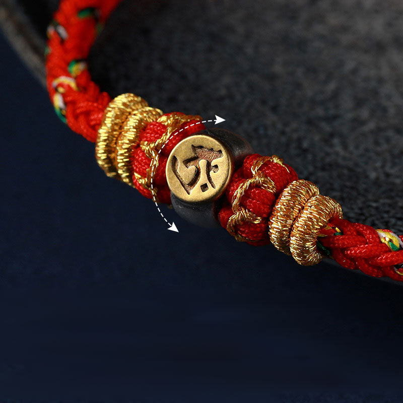 Pulsera de hilo trenzado de la suerte de plata con Buda natal del zodiaco chino de Buddha Stones