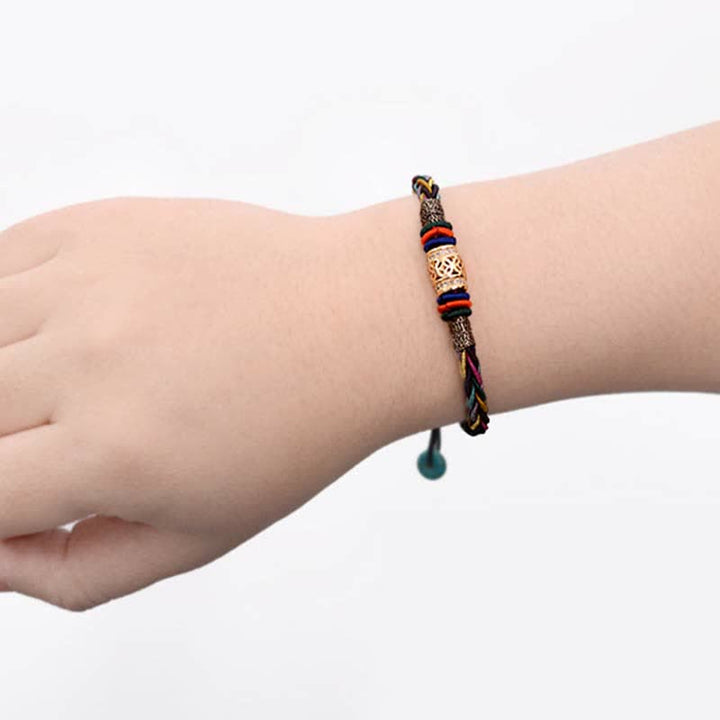 Pulsera de cuerda tejida con moneda de cobre hecha a mano con nudo de ocho hilos, Buddha Stones tibetanas