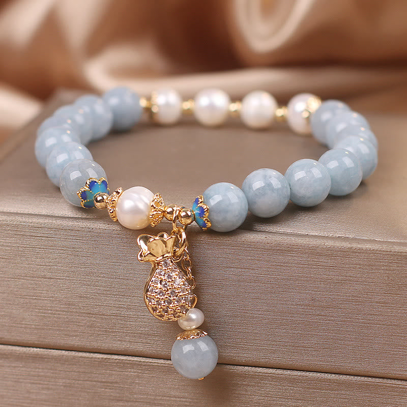 Pulsera con dije para bolsa de dinero con perlas de aguamarina y Buddha Stones