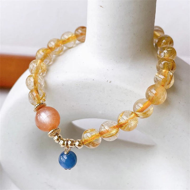 Pulsera de riqueza de cianita con Buddha Stones, oro natural, Cuarzo rutilado, piedra solar