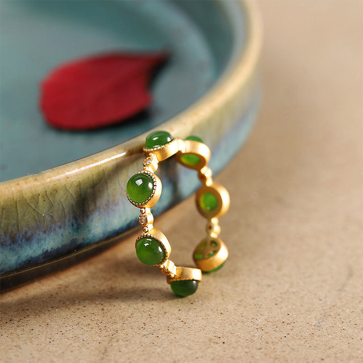Anillo ajustable calmante curativo de jade cian con Buddha Stones