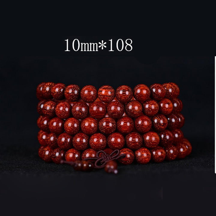 Pulsera de equilibrio de sándalo rojo con hoja pequeña tibetana de Buddha Stones