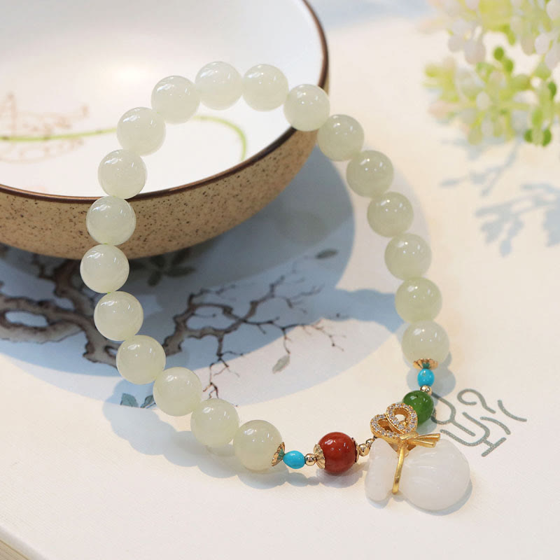 Pulsera de bendición para bolsa de dinero chapada en oro de 14 quilates con jade blanco hetiano natural con Buddha Stones