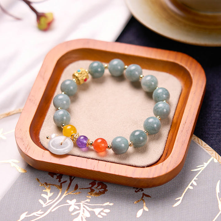 Pulsera de confianza con dije de hebilla de paz y ágata roja de jade con Buddha Stones