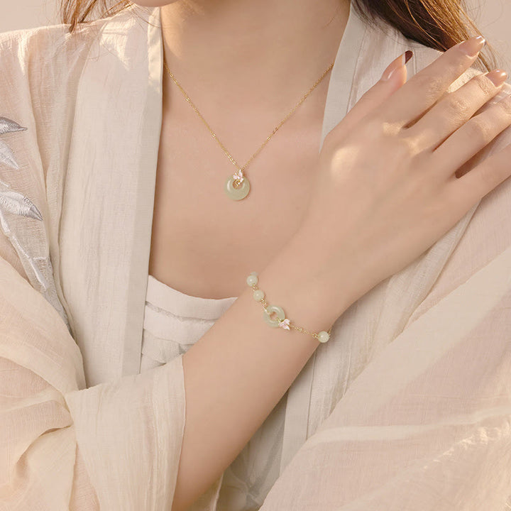 Juego de colgante de collar y pulsera de la suerte de orquídeas con hebilla de la paz de Jade Hetian Natural de plata de ley 925 con Buddha Stones