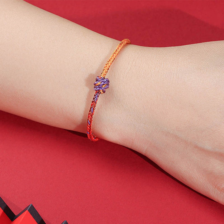 Pulsera de cuerda trenzada roja de oro púrpura colorida hecha a mano con Buddha Stones