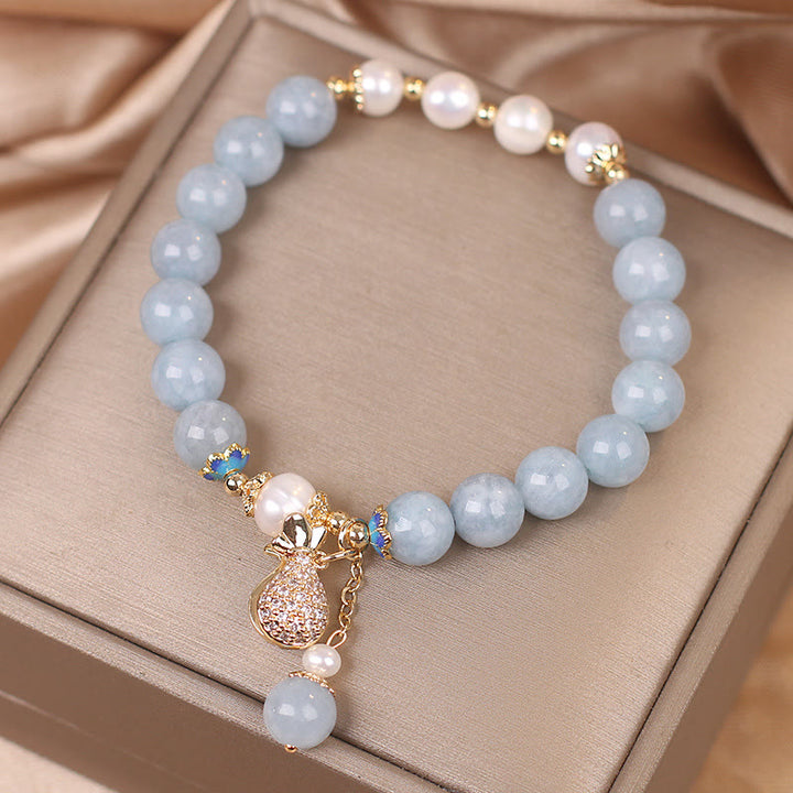 Pulsera con dije para bolsa de dinero con perlas de aguamarina y Buddha Stones