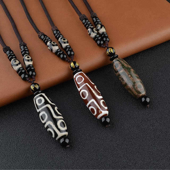 Collar de protección de la riqueza con cuentas Dzi de nueve ojos y Buddha Stones