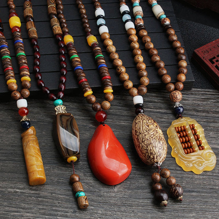 Buddha Stones, colgante de collar de paz de equilibrio de ágata de semilla Bodhi de madera de wengué tibetano