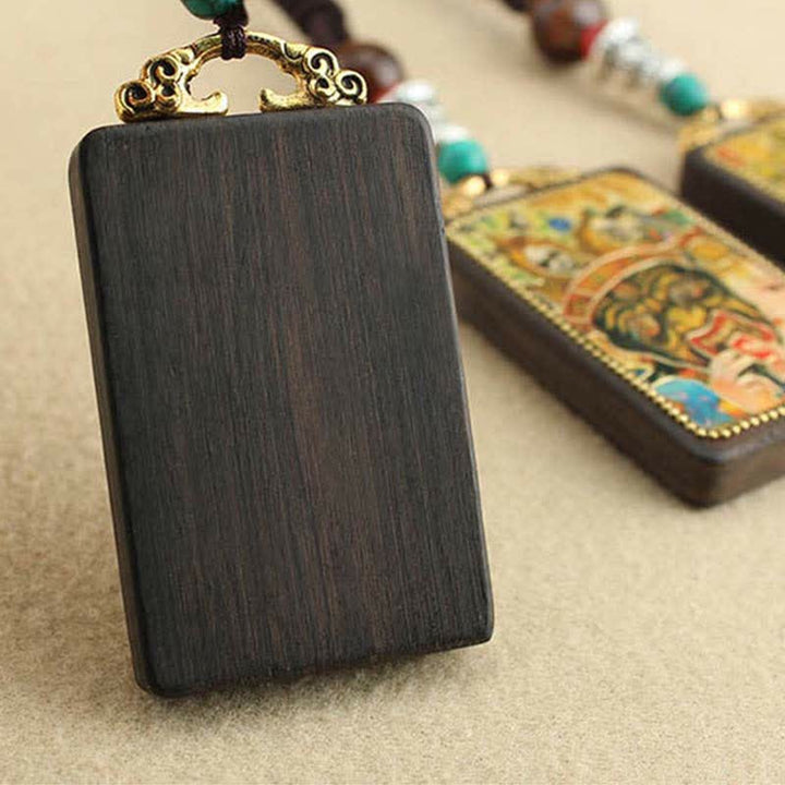 Colgante de collar de paz de ébano Thangka, dios de la riqueza del Tíbet, Buddha Stones