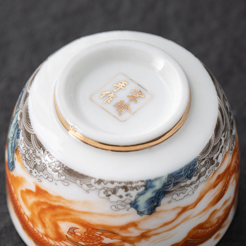 Buddha Stones Dragón Fénix Grulla Sol Océano Olas Taza de té de cerámica dorada Taza de té de Kung Fu 170 ml