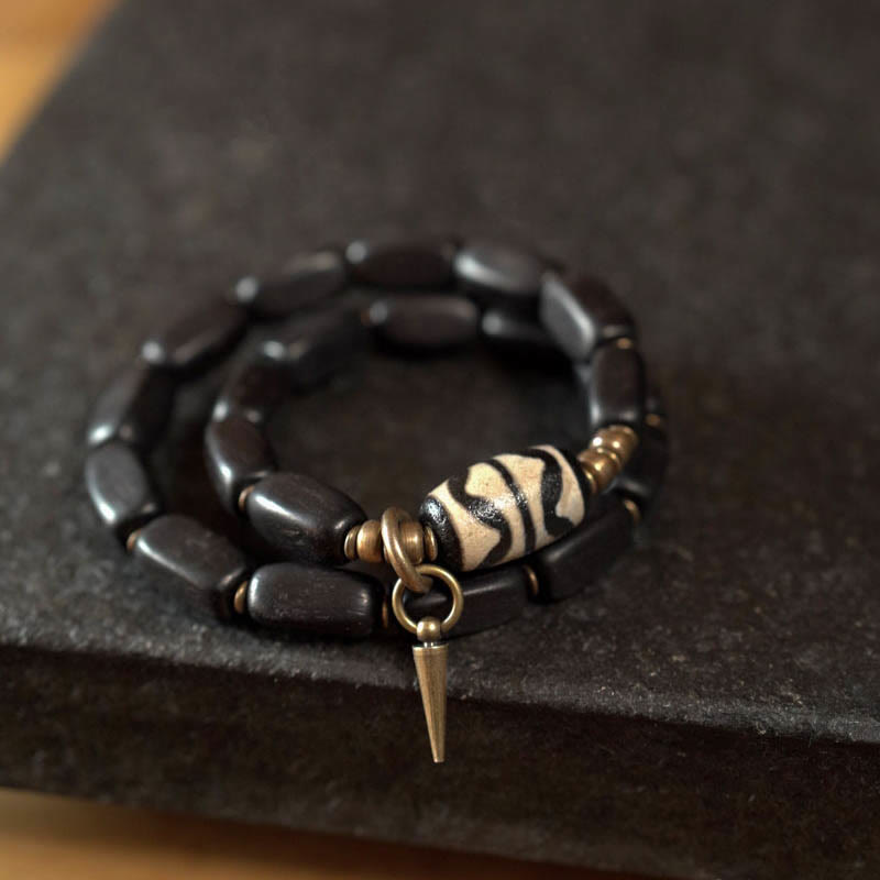 Pulsera de doble envoltura con cuentas Dzi de madera de ébano del Tíbet con Buddha Stones